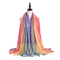 Detail of colorful paisley jacquard scarf with rainbow gradient fringe on model - Paisley Pink