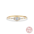Detail view of gold-plated 925 sterling silver ring with cluster-set round and baguette stones - US 6 / Vintage Cluster White Zirconia Gold Style (Style 4)