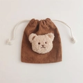 Detail of dark brown corduroy drawstring pouch with a plush white bear patch embroidery - Brown (Milk Tea Bear)