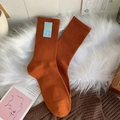 Chaussettes mi-mollet en coton côtelé caramel avec écusson sourire bleu pour femme - Taille unique / Rouge Orangé