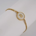 Golden Figaro chain bracelet with shell pendant featuring a gold letter B initial - Mother of Pearl / Letter B / White
