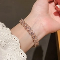 Detail of pear-cut pink gemstone bracelet with silver setting worn on wrist - 51# Bracelet - Silver - Pink