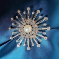 Rose gold sunburst brooch with center pearl and sparkling rhinestone accents - Sunflower Brooch