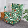 Single wingback chair with elastic cactus print cover in green and white tones - Cactus