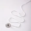 Close-up of 24-ply braided cotton candle wick with a round metal sustain tab base - 15m