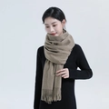 Elegant camel thickened cashmere scarf with fringes shown on a model for winter - Thickened Tassel Style (330g) / 200*70cm / Rice Camel
