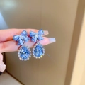 Elegante blauwe kristallen strik clip-on oorbellen in de vorm van een waterdruppel - Zilveren Pin - Blauwe Strik Waterdruppel