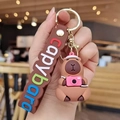 Porte-clés Capybara marron avec chapeau rose, mini appareil photo et bracelet en silicone - Appareil Photo