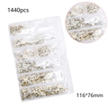 Macro view of 1440pcs flatback crystal glass nail rhinestones in a multi-grid pack - Blue Moonlight