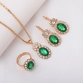 Golden bridal jewelry set featuring oval green gemstones and crystal diamond accents - Three-Piece Set / Oval-Green