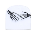Detail of white knit beanie featuring black skull hand jacquard punk street style - White