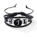 Braided black leather bracelet featuring a silver bead and a round black 'J' letter charm - Letter-J