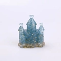Fairy tale castle resin ornament with blue crystals and golden flakes on white background - Aquamarine Type 2
