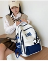 Detail of college style cream backpack with blue SJM print and cute panda charm - Blue (No Pendant)