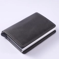 Slim RFID carbon fiber wallet in charcoal grey with an aluminum pop-up card mechanism - PU Dark Grey