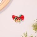 Detail of red Christmas bow with golden bells and green leaves for festive decoration - Red with Green Leaves