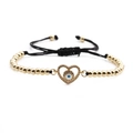 Modisches Herz-Anhänger-Armband mit bösem Blick-Motiv in Gold- und Schwarzperlen - Herz Böser Blick / Schwarzes Seil mit Kupferperlen