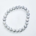 8mm white cat eye stone bead bracelet with black textures on a clean white background - Black Line White Turquoise