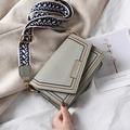 Light gray-green square crossbody bag with patterned wide strap and wave stitching - Green