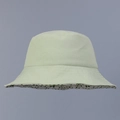 Close-up of light green corduroy bucket hat with green floral pattern inner lining - M(56-58cm) / Light Green Outer Layer with Green and White Floral Lining / Green