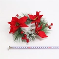 Detailed view of red poinsettia Christmas wreath with pine needles and scale ruler - Red Poinsettia Snow Pine Wreath