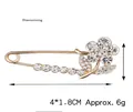 Squisita spilla a fiore dorata con strass scintillanti, accessorio moda da 4x1,8 cm - Fiore a sei petali