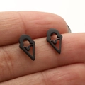 Macro shot of matte black hollowed ice cream cone stud earrings in stainless steel - 681 Black (Ice Cream)