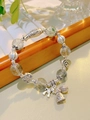 Ethnic vintage bracelet with green crystal beads, silver fish charms and longevity lock - 12mm Green Ghost: Auspicious Clouds Fortune Fish Instant Wealth