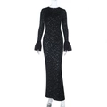 Sparkly black long sleeve evening dress with sequined finish and flared cuffs - S / Black