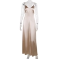 Detail of elegant champagne satin maxi dress with spaghetti straps and a deep V-neckline - S / Champagne
