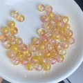 8mm ijsgebarsten glazen kralen in geel en oranje verloop voor DIY armbanden maken - 8mm / Goud-Roze Gebarsten