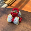 Detail of red and blue polka dot bow hair claw clip showing fabric texture and spring mechanism - Blue Red Polka Dot Bow Claw Clip with Yellow Trim