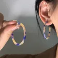 Detail of large blue and beige shell-pattern hoop earrings showing acrylic resin texture - Blue-Yellow (21# Silver Pin)