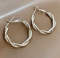 Silver twisted hoop earrings with a textured metal finish in a chunky punk style - Silver Twisted Texture Style