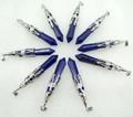 Top view of ten lapis lazuli hexagonal point pendants with silver filigree caps in a circle - Antique Silver Amethyst