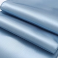 Elegant blue satin table runner with glossy texture and soft drape for weddings - 30x275cm / Dusty Blue