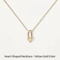 Elegant 18K gold heart lock pendant necklace featuring a central sparkling diamond gemstone - Heart Lock / Gold