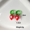 Handmade red glass strawberry earring pendants with dimensions 2cm height and 1.3cm width - White Spotted Chili