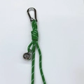 Green and white paracord woven keychain with silver metal ball pendant and carabiner - Green