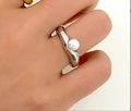 Silver fluid ribbon ring featuring a large white pearl on a minimalist open band - Silver Pearl Streamline Ring (5941)