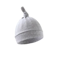 Detail showing the soft grey fabric texture and knot design of this newborn baby beanie - Gray