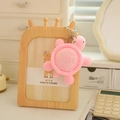 Pink plush turtle keychain with soft fur texture and a durable metal clasp hanging on a frame - Pink Style (Style 18) / 10cm