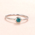 Minimalist silver stainless steel ring with a round teal birthstone in bezel setting - US Size 7 / Steel-Cyan (Mar)