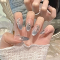 Blauwe kattenoog kunstnagels in lange amandelvorm met fonkelende steentjes decoratie - Klein (S) / 2259-Medium Ovaal Cat Eye Stijl