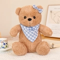 Light brown teddy bear plush with blue checkered scarf and bow in home setting - Blue Bandana / 20cm