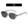 Retro ovale doorschijnende grijze zonnebril met donkere glazen in de kleurvariant C5 - Doorschijnend grijs frame Grijze lens
