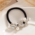 Elastic black ponytail holder featuring silver sea shells, turtle, and pearls charms - Silver - Marine Elements