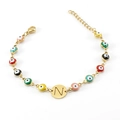 Pulsera Evil Eye dorada con cuentas de colores y dije de letra N calada metálica - Letra N