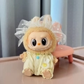 Labubu plush figure wearing a yellow dress with white lace and matching head bow - Yellow Rabbit Head Bodysuit / First And Second Generation Keychains Are Compatible With La Cloth Dolls. Dolls Not Included.