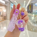 Purple unicorn milk tea keychain with floating glitter liquid and silicone wrist strap - Purple-Unicorn Milk Tea Cup